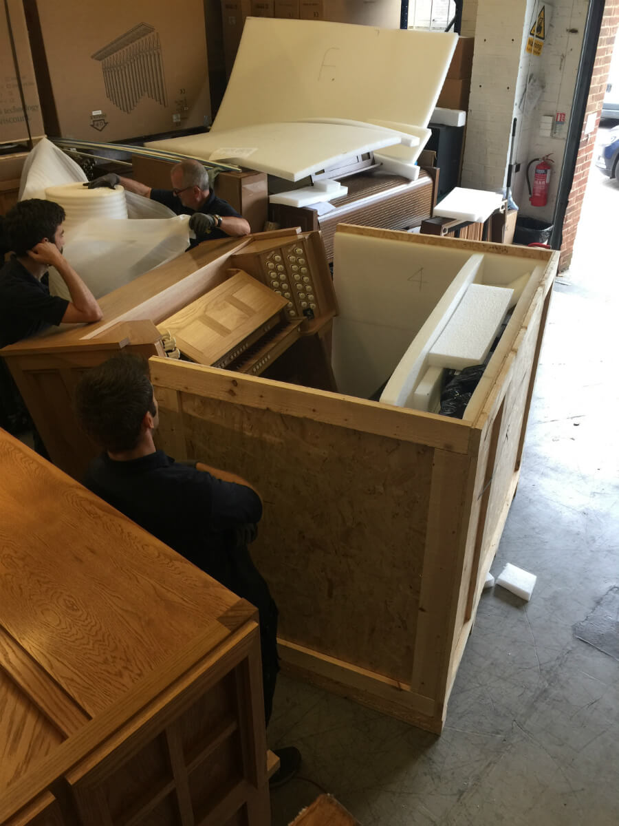 Fitting organ into crate